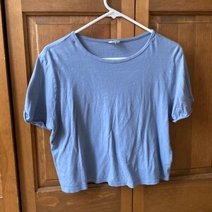 Essentials women’s size medium blue cropped T-shirt